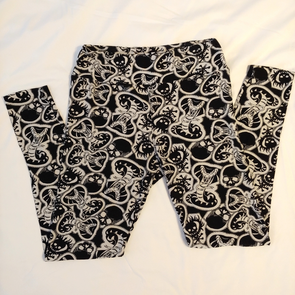 3/$15 Black and White Skull and Snake Leggings. Size S